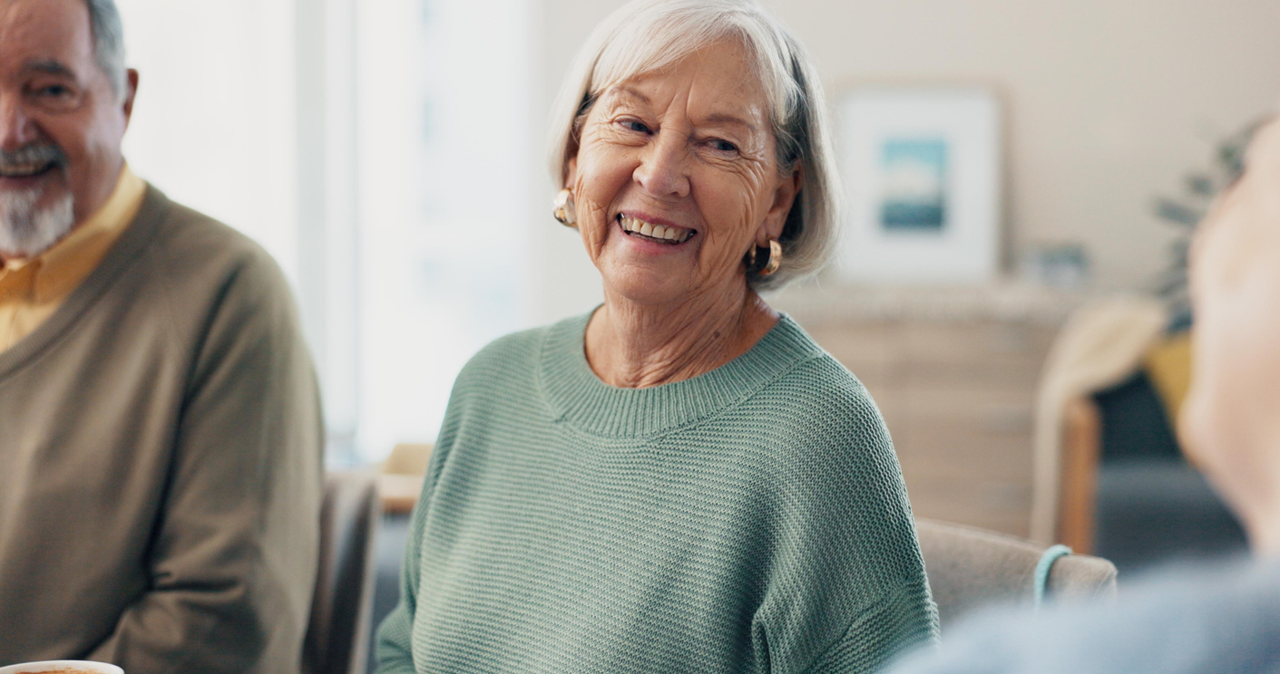 Happy senior resident enjoying community life